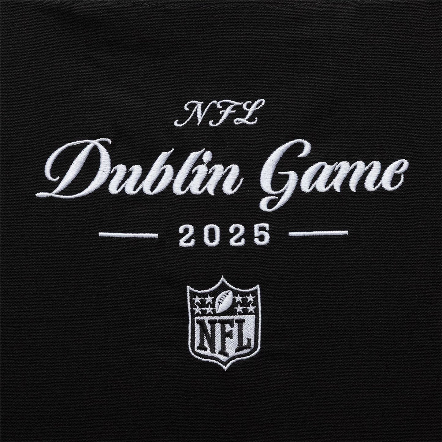 This is a Shield Logo NFL Dublin Game 2025 Black Tote Bag  3