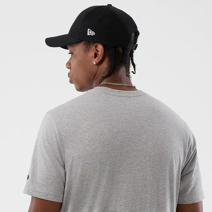 The Male model is wearing  New Era Back To School Grey T-Shirt  7