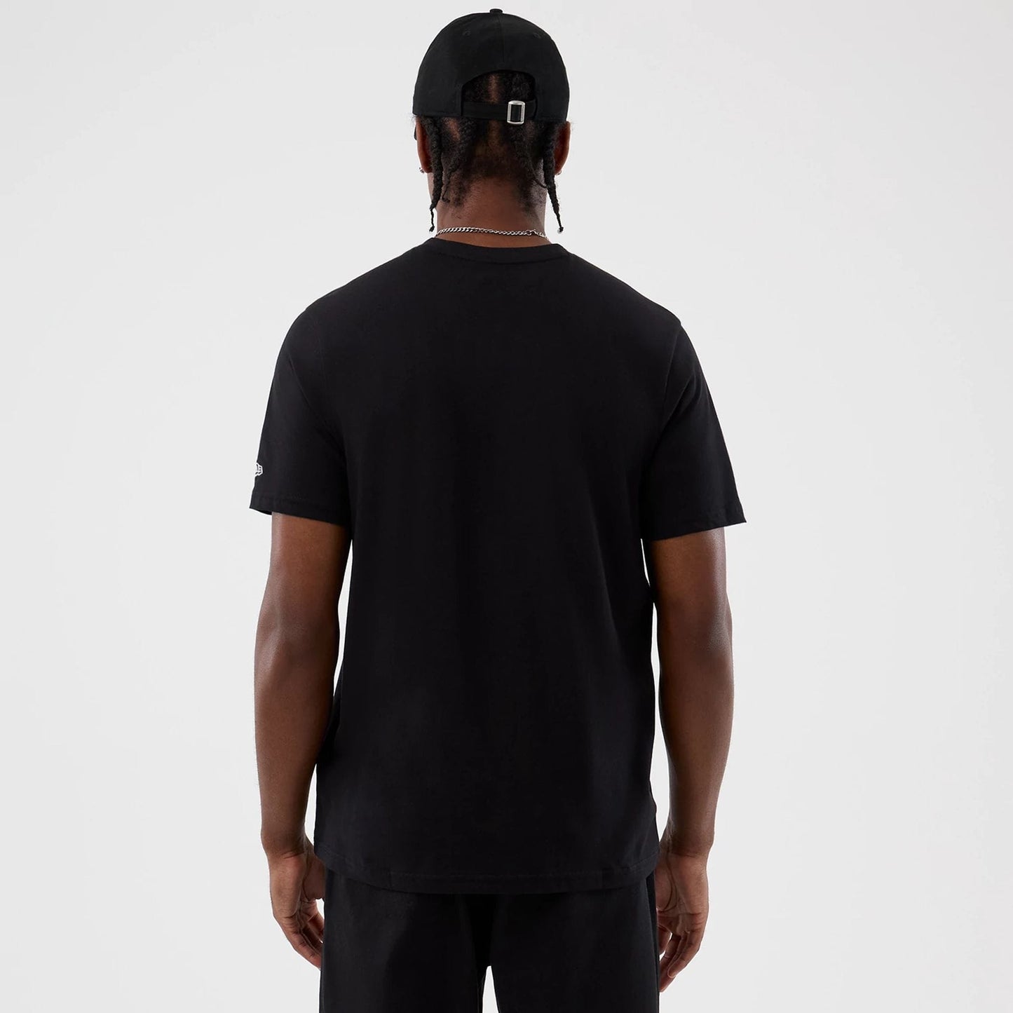 The Male model is wearing  New Era Back To School Black T-Shirt 2