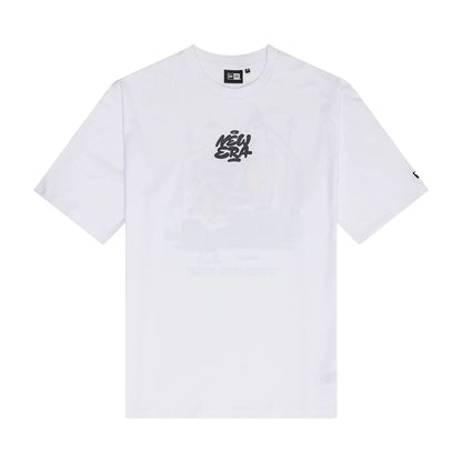 The Male model is wearing New Era Graffiti Graphic White Oversized T-Shirt 1