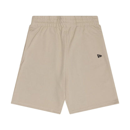 The Male model is wearing New Era Flag Light Beige Shorts 1