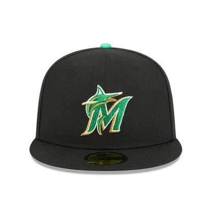 Pictured is this MLB Saint Patrick's Day Miami Marlins 59FIFTY Fitted cap in black. 2