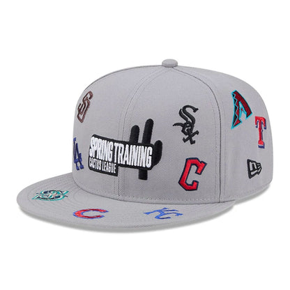 Pictured is this MLB Scattered Cactus League Logo 9FIFTY Snapback cap in grey. 1