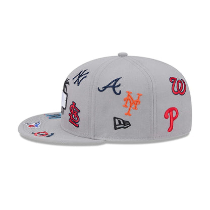Pictured is this MLB Scattered Grapefruit League Logo 9FIFTY Snapback cap in grey. 5
