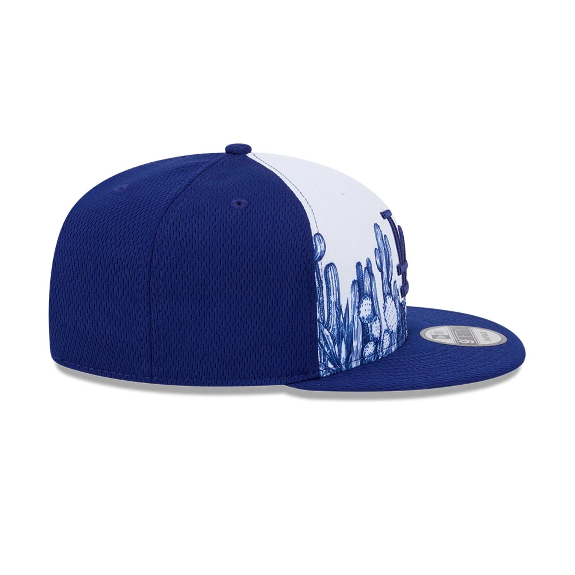 Pictured is this MLB Grow LA Dodgers 9FIFTY Snapback cap in dark blue. 7