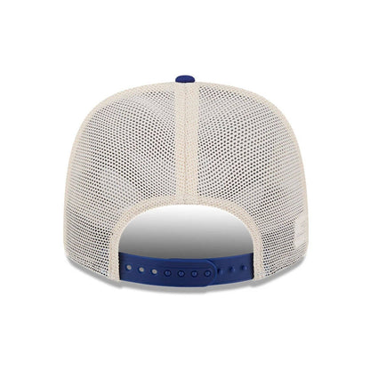 Pictured is this MLB Patch LA Dodgers 9SEVENTY Stretch Snap cap in dark blue. 7