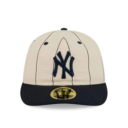 Pictured is this MLB Linen New York Yankees Retro Crown 59FIFTY Fitted cap in navy. 3