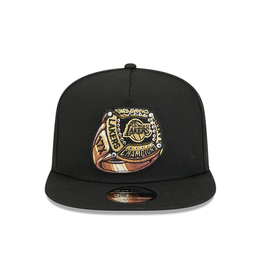 Pictured is this NBA Ring LA Lakers 9FIFTY A-Frame Snapback cap in black. 3