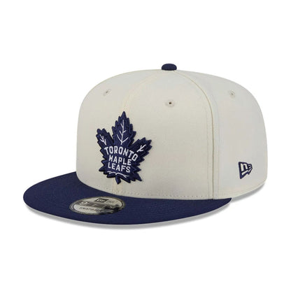 Pictured is this NHL Localized Toronto Maple Leafs 9FIFTY Snapback cap in white. 4