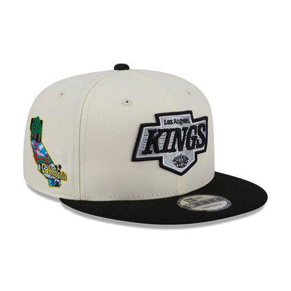 Pictured is this NHL Localized LA Kings 9FIFTY Snapback cap in white. 1