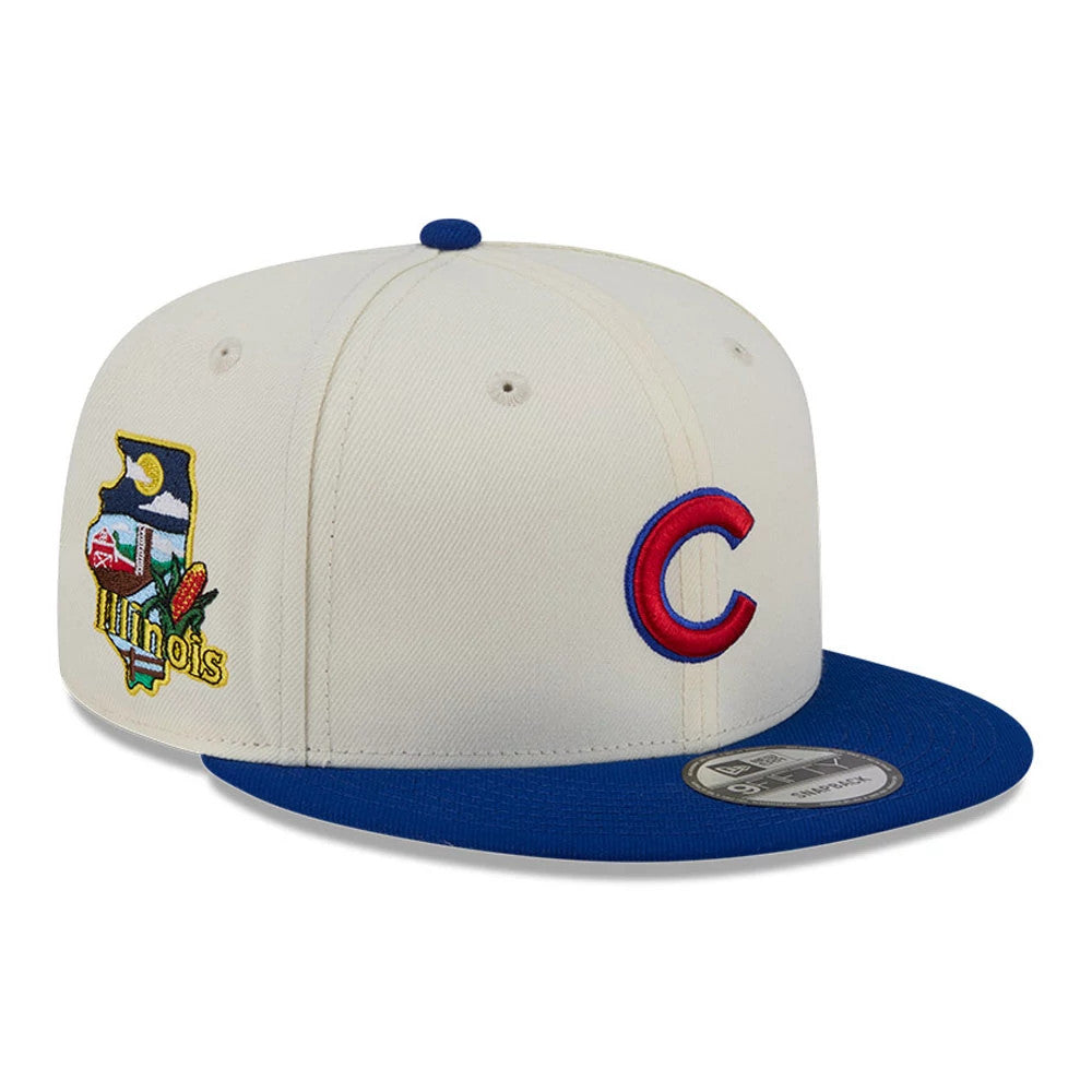 Pictured is this MLB Localized Chicago Cubs 9FIFTY Snapback cap in white. 1