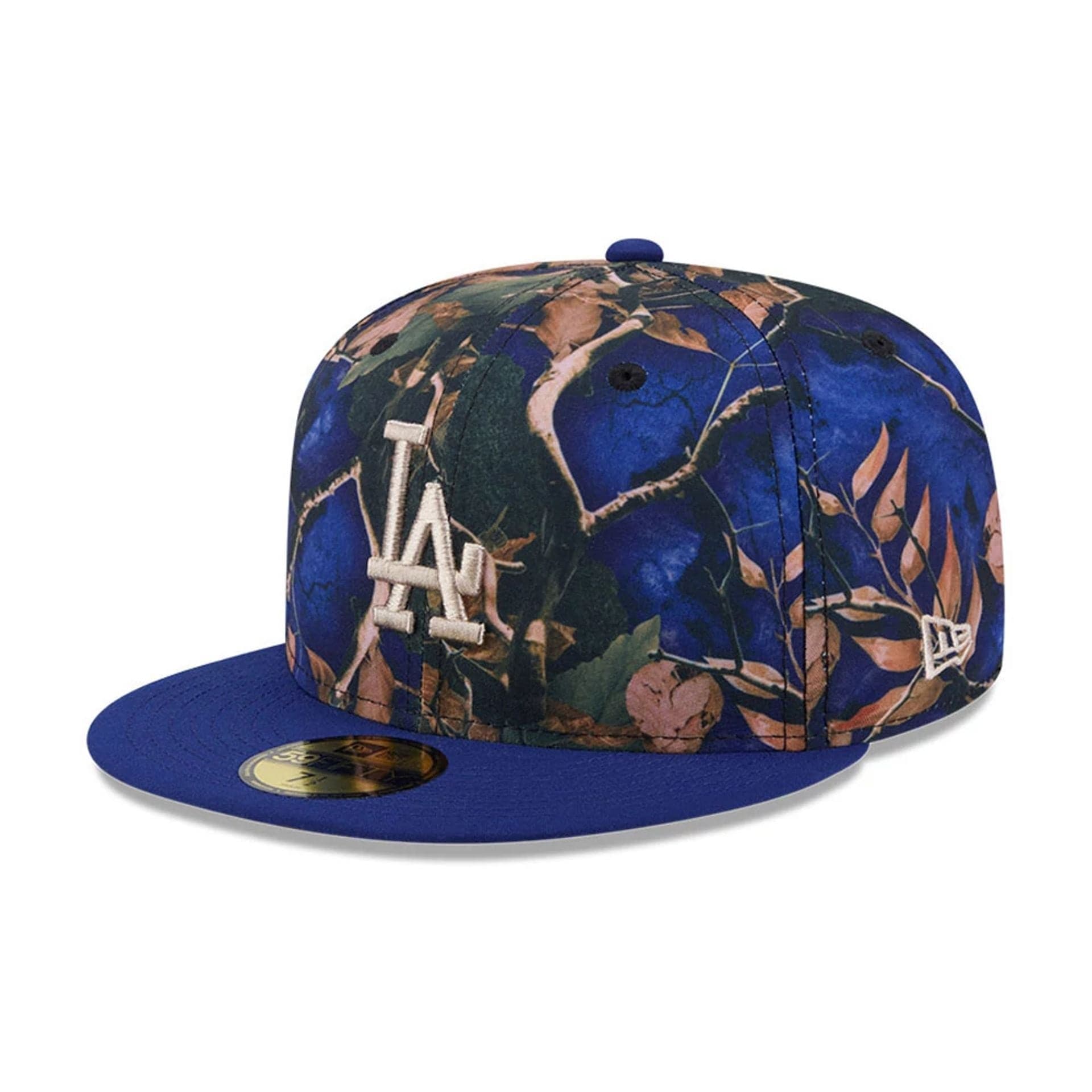 Pictured is this MLB Leaves LA Dodgers 59FIFTY Fitted cap in dark blue. 4