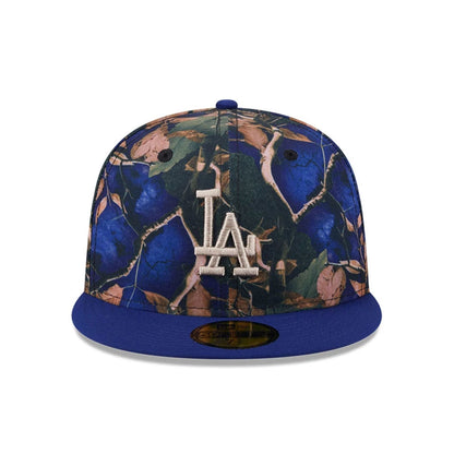Pictured is this MLB Leaves LA Dodgers 59FIFTY Fitted cap in dark blue. 3