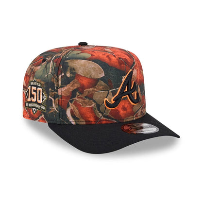 Pictured is this MLB Leaves Atlanta Braves 9FIFTY A-Frame Snapback cap in bright orange. 1