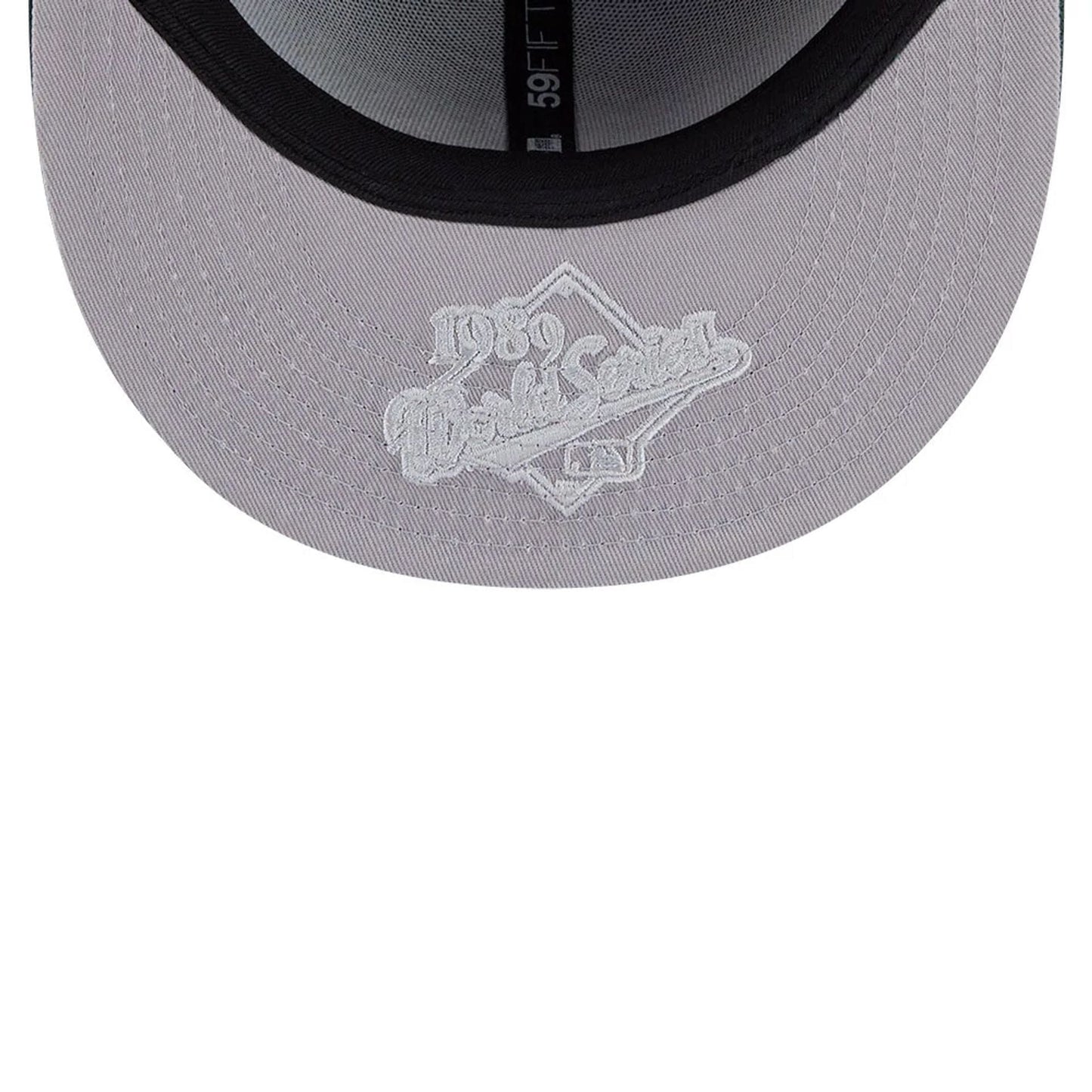 Pictured is this MLB Hidden Hit Athletics 59FIFTY Fitted cap in dark green. 2