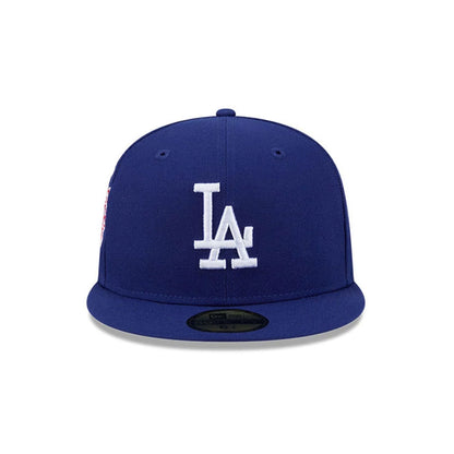 Pictured is this MLB Hidden Hit LA Dodgers 59FIFTY Fitted cap in dark blue. 3