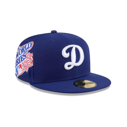 Pictured is this MLB Hidden Hit LA Dodgers 59FIFTY Fitted cap in dark blue. 1