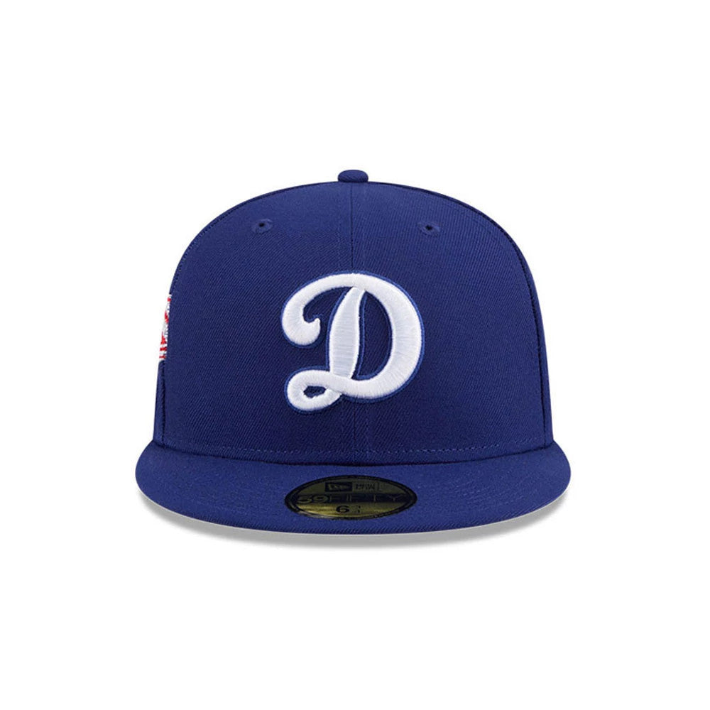 Pictured is this MLB Hidden Hit LA Dodgers Cooperstown 59FIFTY Fitted cap in dark blue. 3