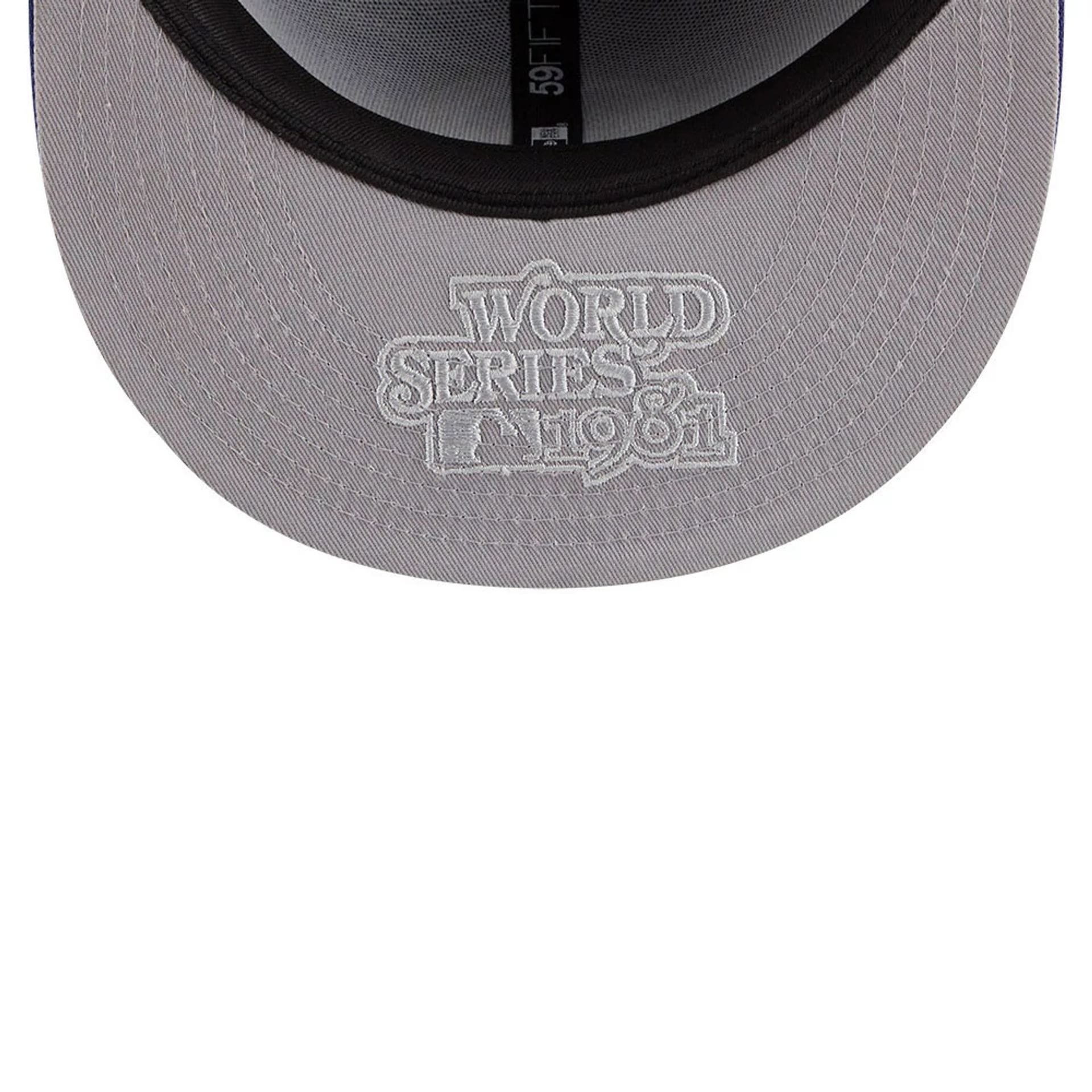 Pictured is this MLB Hidden Hit LA Dodgers 59FIFTY Fitted cap in dark blue. 2