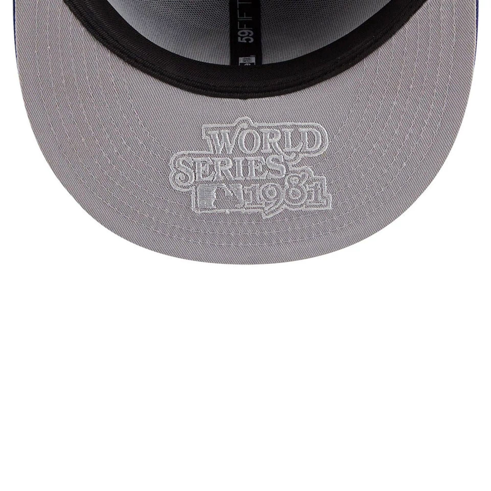 Pictured is this MLB Hidden Hit LA Dodgers 59FIFTY Fitted cap in dark blue. 2