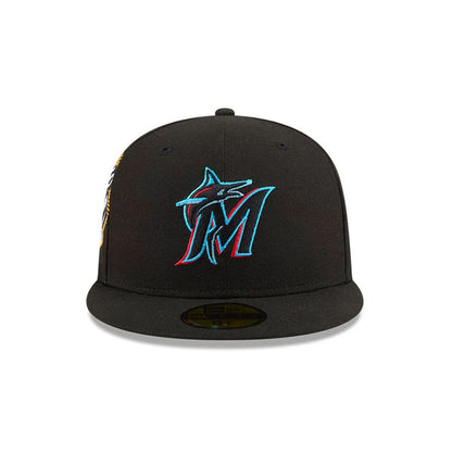 Pictured is this MLB Hidden Hit Miami Marlins 59FIFTY Fitted cap in black. 3