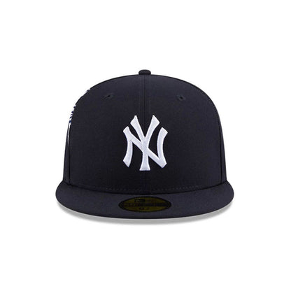 Pictured is this MLB Hidden Hit New York Yankees 59FIFTY Fitted cap in navy. 3