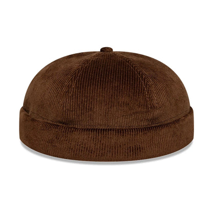 Pictured in this New Era Cord Dark Brown Docker Hat 1