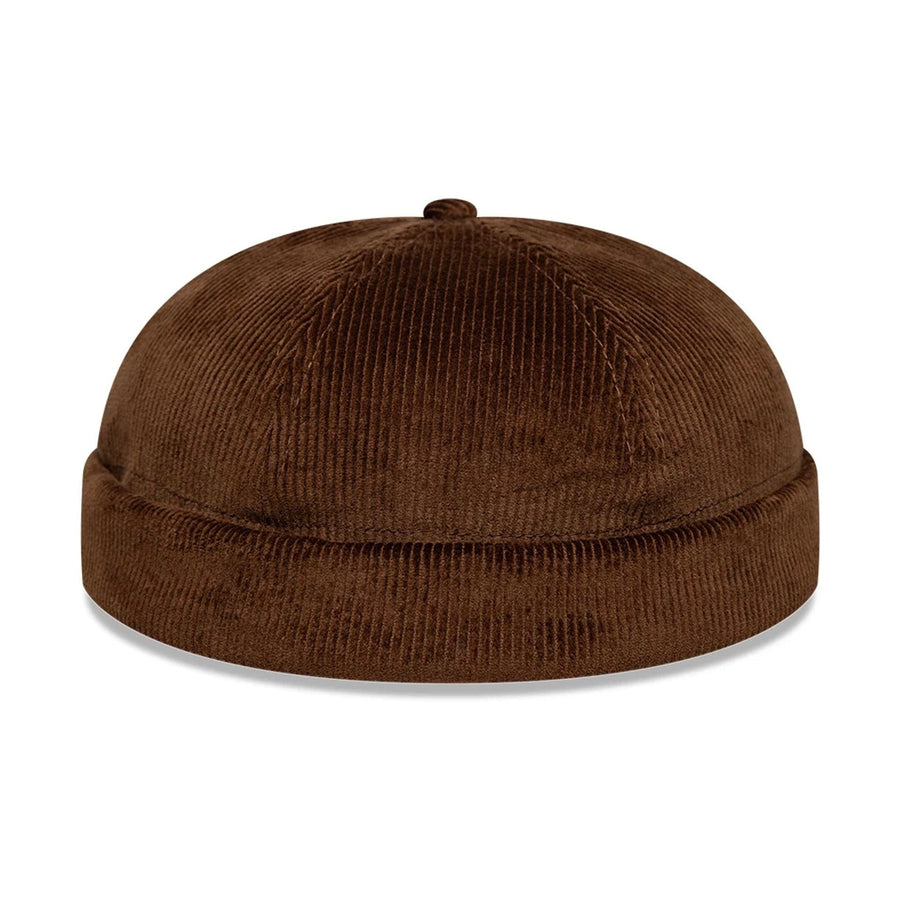 Pictured in this New Era Cord Dark Brown Docker Hat 1