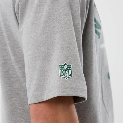 The Male model is wearing New York Jets NFL International Series Games Grey Oversized T-Shirt 6