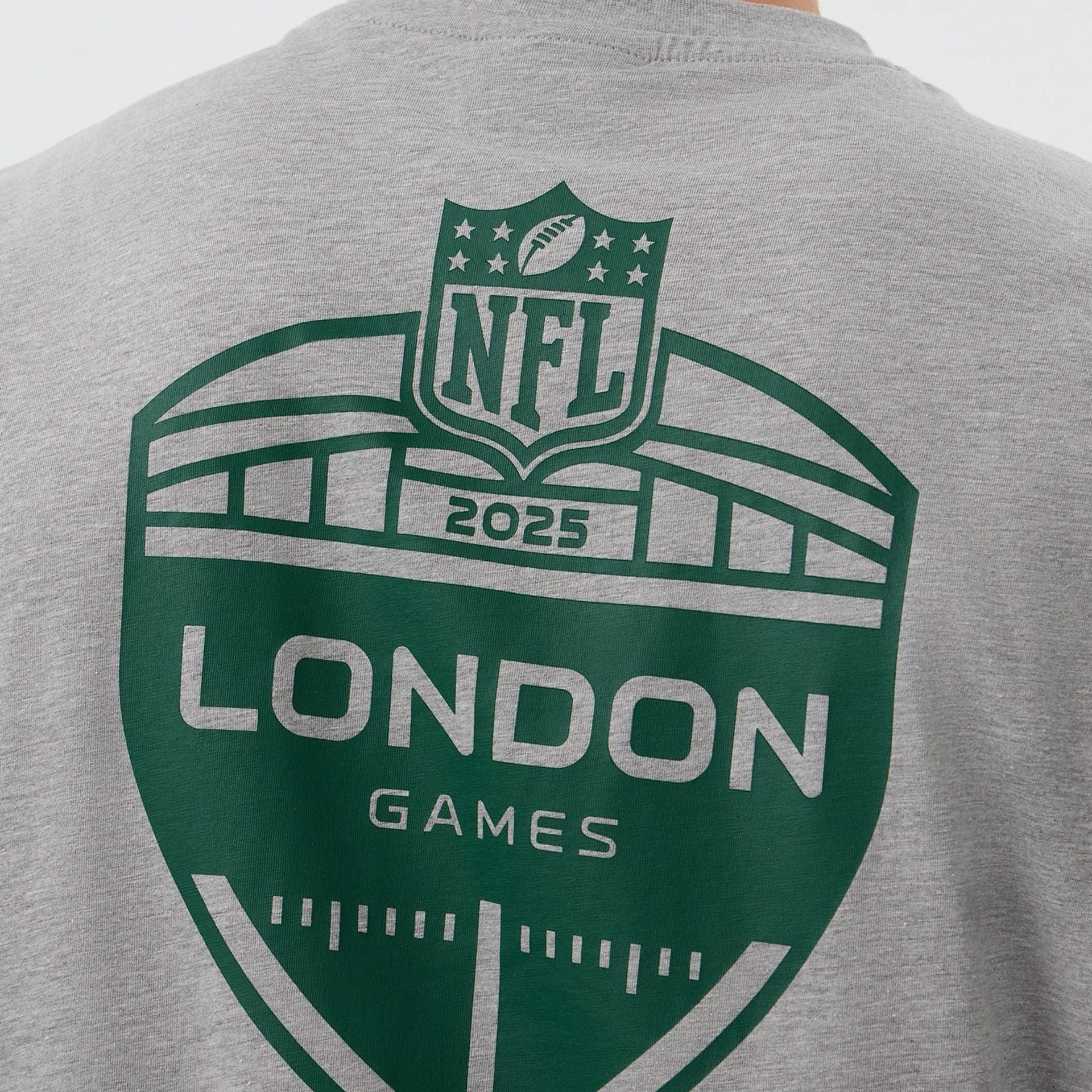 The Male model is wearing New York Jets NFL International Series Games Grey Oversized T-Shirt  4