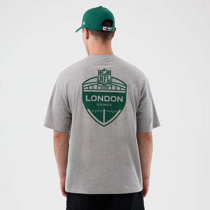 The Male model is wearing New York Jets NFL International Series Games Grey Oversized T-Shirt  2