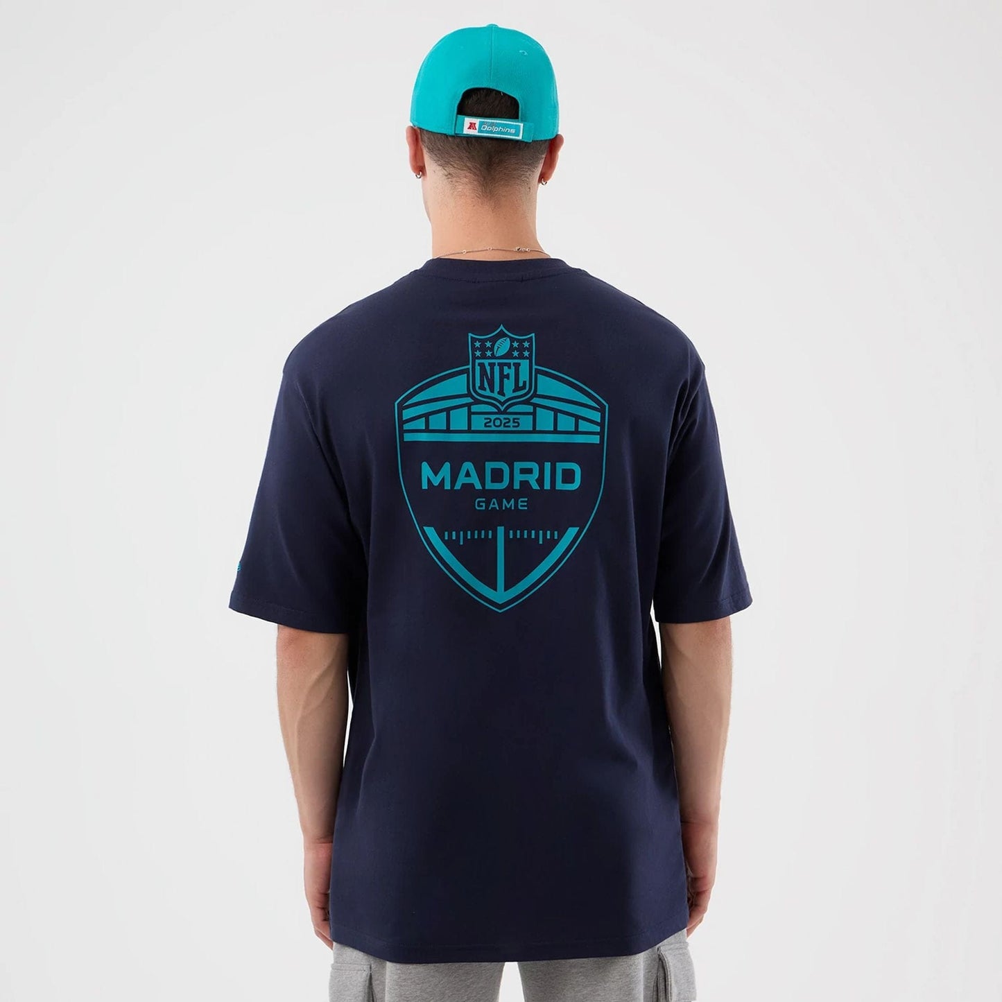 The Male model is wearing Miami Dolphins NFL International Series Games Navy Oversized T-Shirt  2