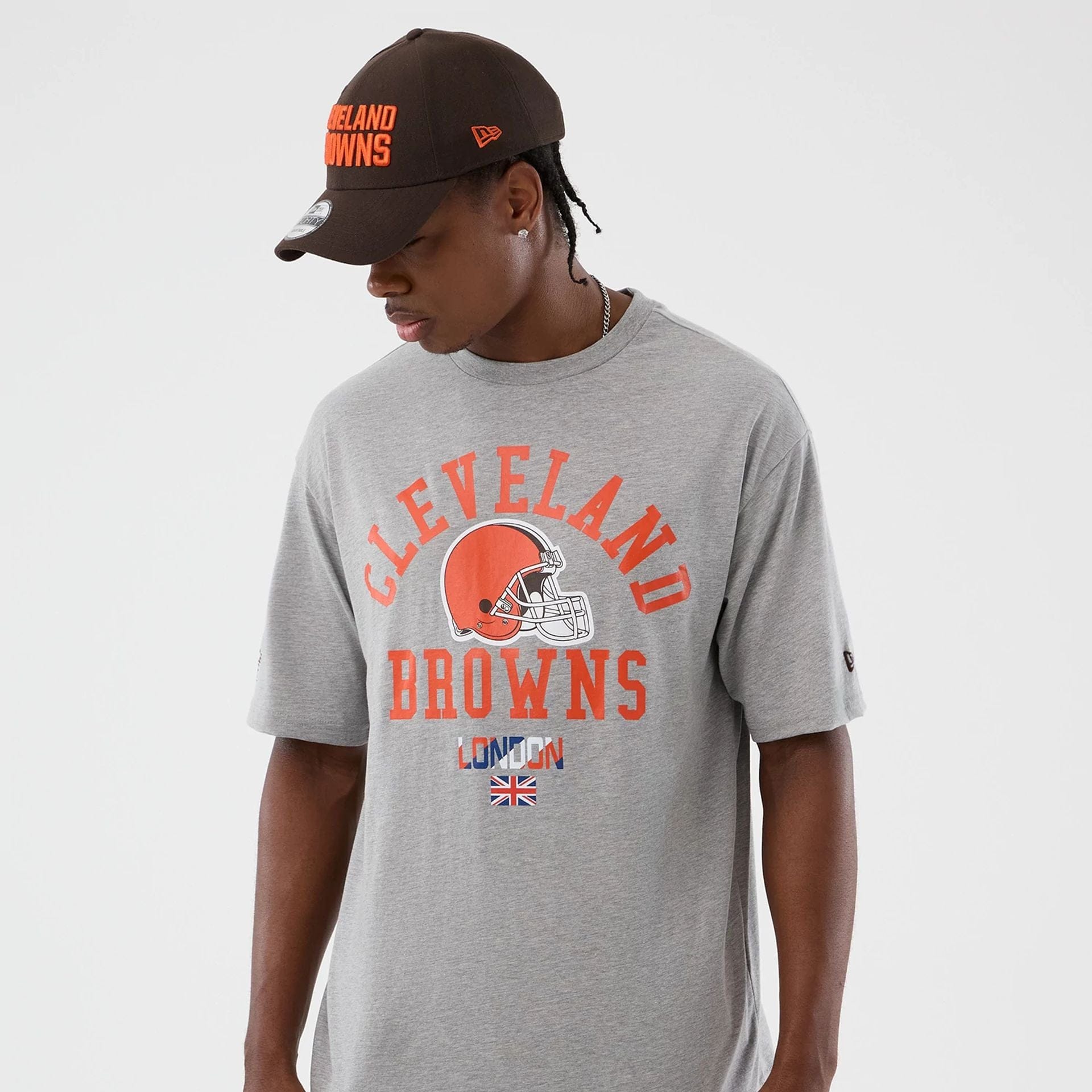The Male model is wearing Cleveland Browns NFL International Series Games Grey Oversized T-Shirt  5