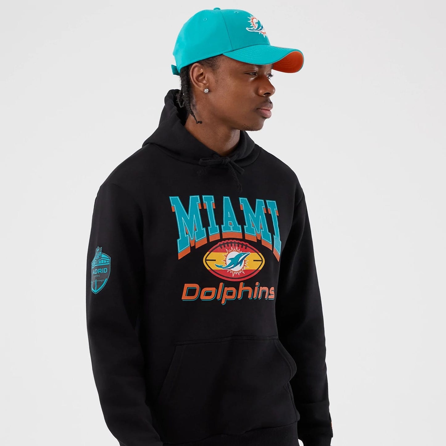 The Male model is wearing Miami Dolphins NFL International Series Games Black Pullover Hoodie 6