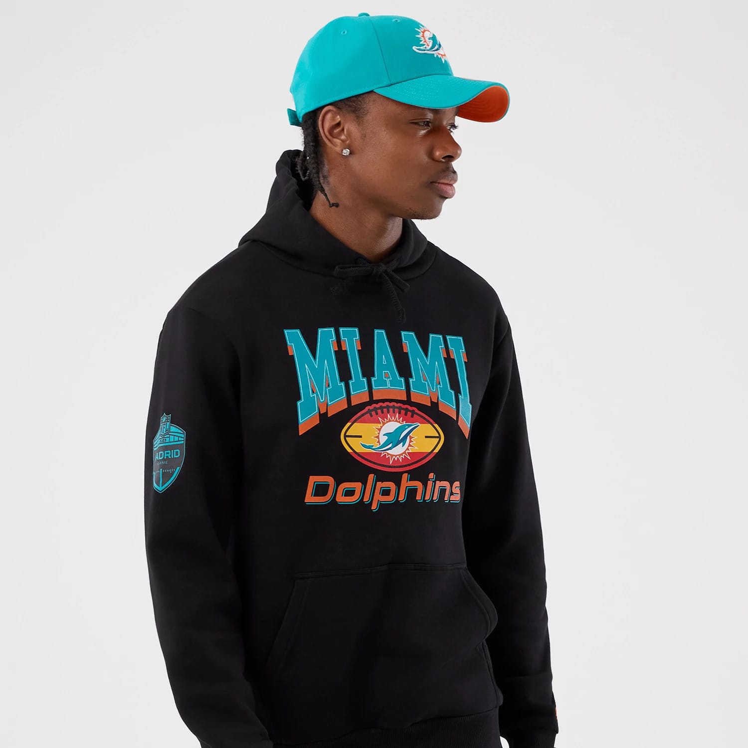 The Male model is wearing Miami Dolphins NFL International Series Games Black Pullover Hoodie 6