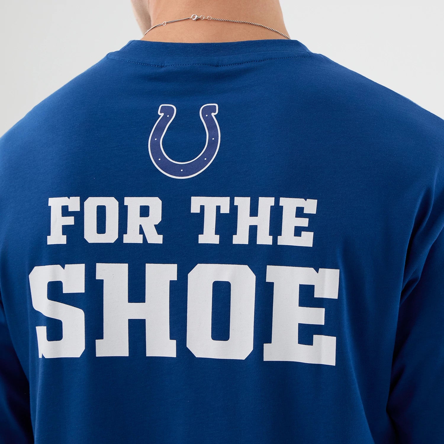 The Male model is wearing Indianapolis Colts NFL International Series Games Script Blue Oversized T-Shirt 6