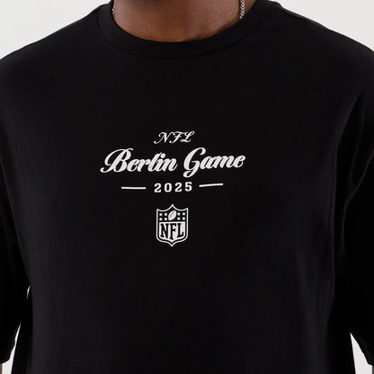 The Male model is wearing Berlin NFL International Series Games Black Oversized T-Shirt 3