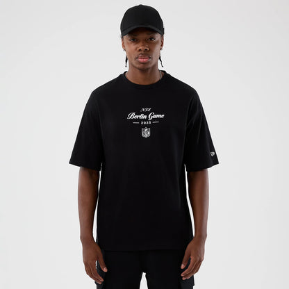 The Male model is wearing Berlin NFL International Series Games Black Oversized T-Shirt 1