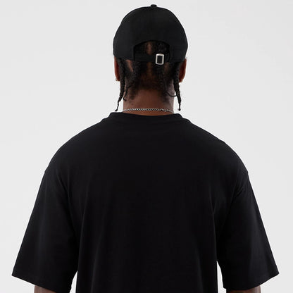 The Male model is wearing Berlin NFL International Series Games Black Oversized T-Shirt  7