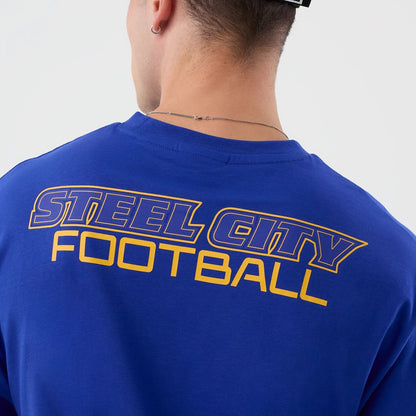 The Male model is wearing Pittsburgh Steelers NFL International Series Games Blue Oversized T-Shirt  6