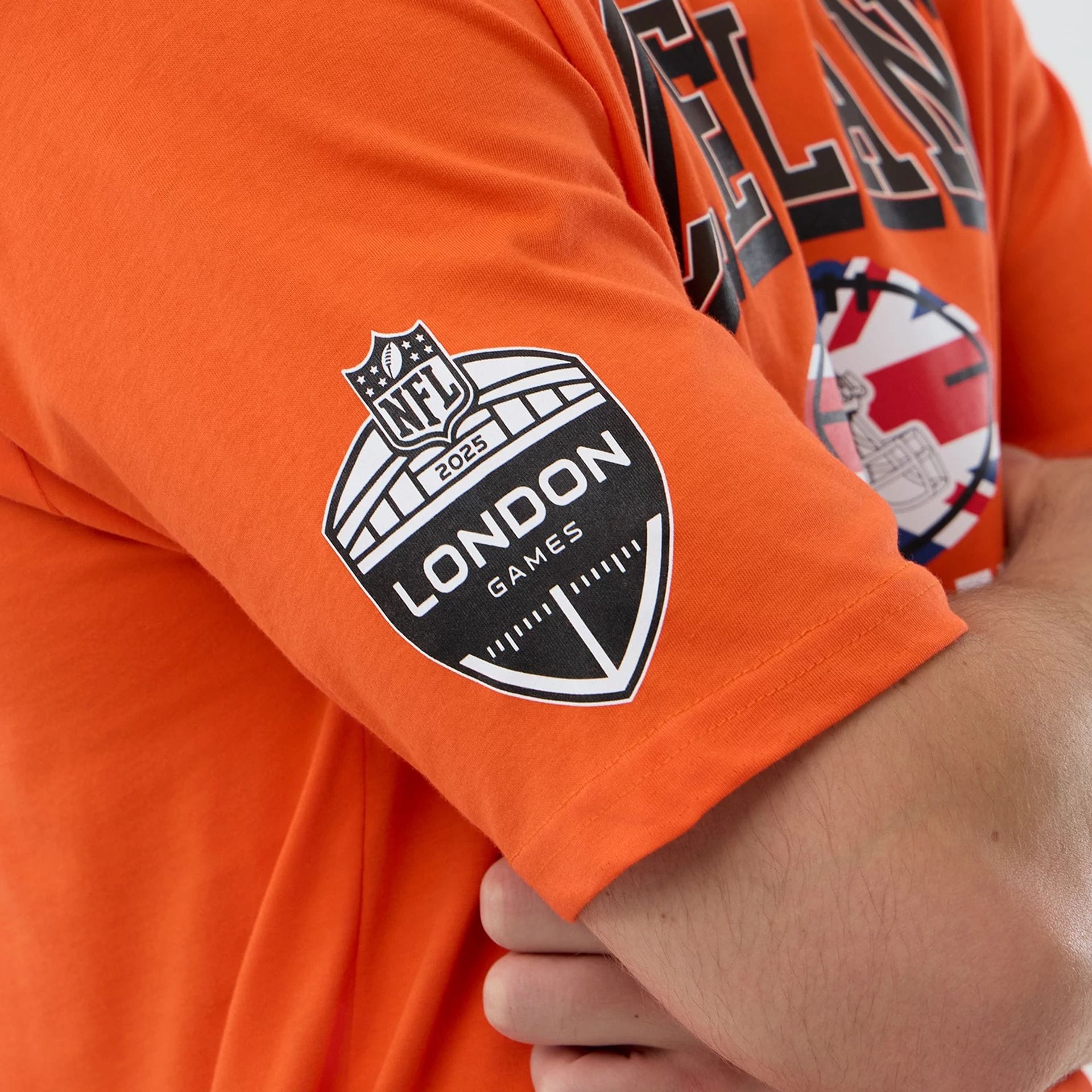 The Male model is wearing Cleveland Browns NFL International Series Games Orange Oversized T-Shirt  5