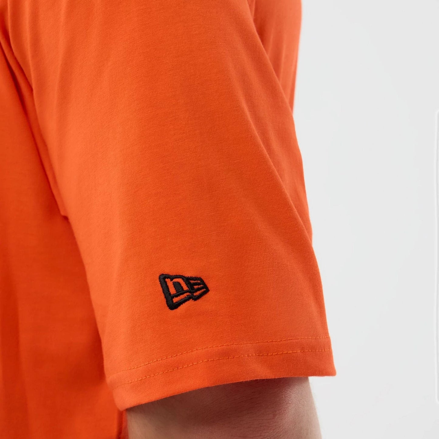 The Male model is wearing Cleveland Browns NFL International Series Games Orange Oversized T-Shirt  6
