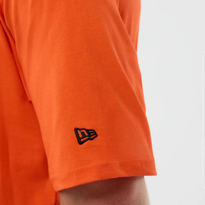 The Male model is wearing Cleveland Browns NFL International Series Games Orange Oversized T-Shirt  6