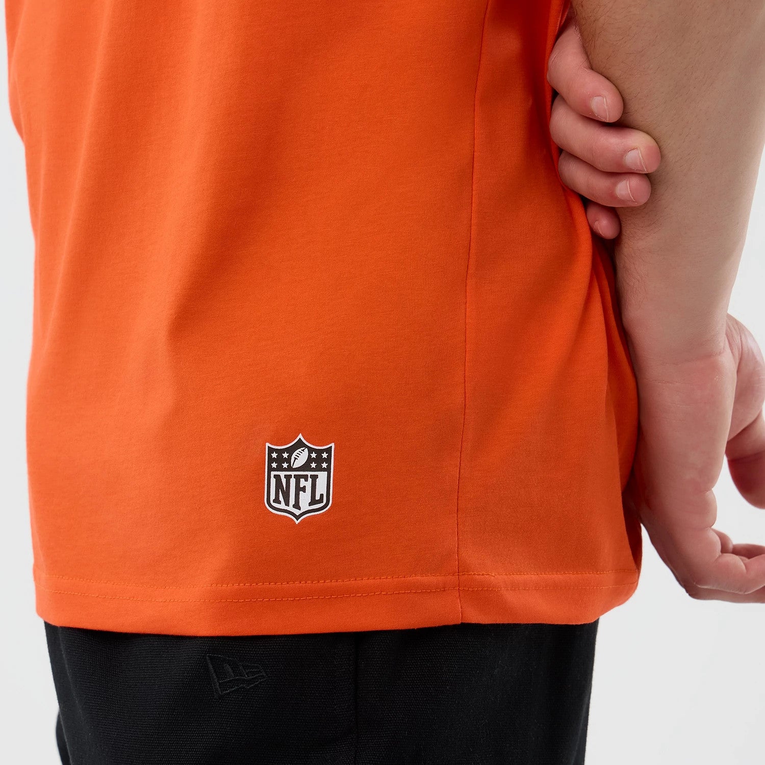 The Male model is wearing Cleveland Browns NFL International Series Games Orange Oversized T-Shirt 7