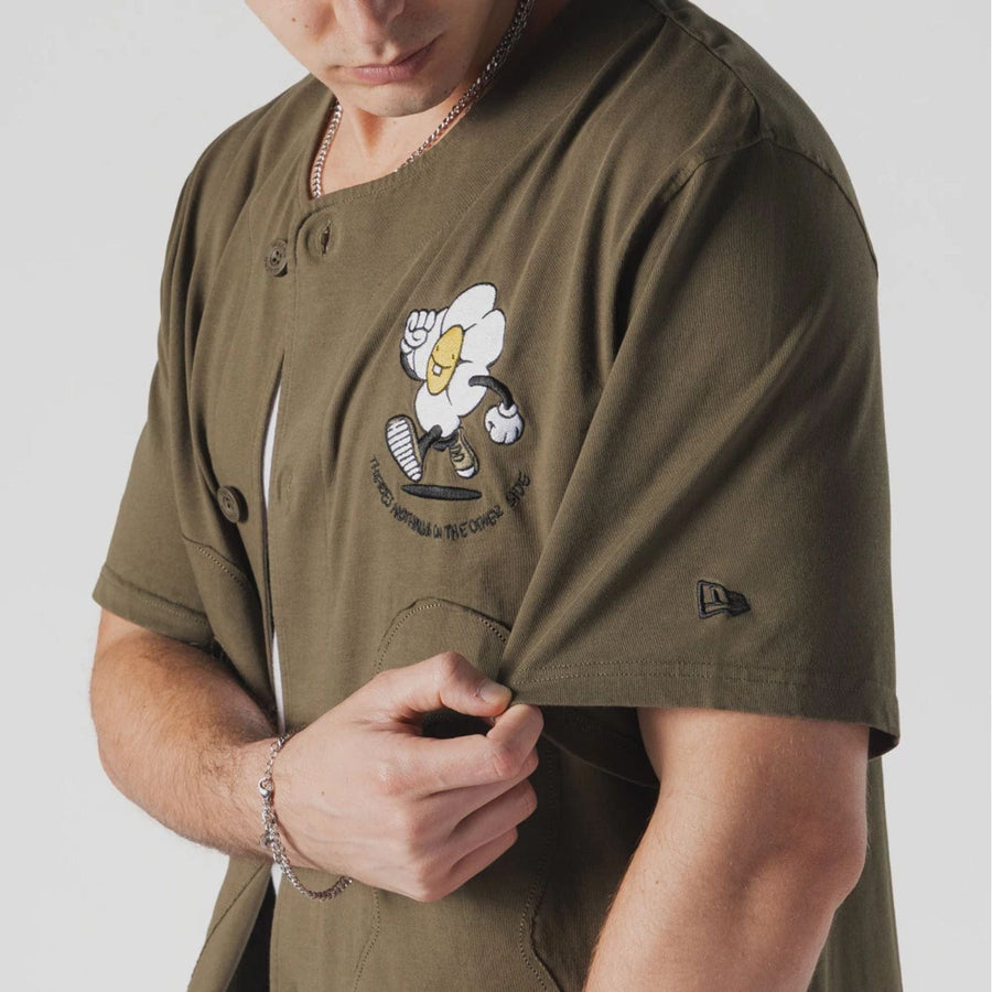 The Male model is wearing  New Era x Rodrigo Roji Flower Green Jersey  3