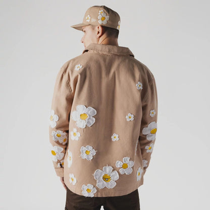 The Male model is wearing  New Era x Rodrigo Roji Flower Light Beige Jacket  2