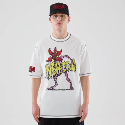 The Male model is wearing Stranger Things White Oversized T-Shirt  1