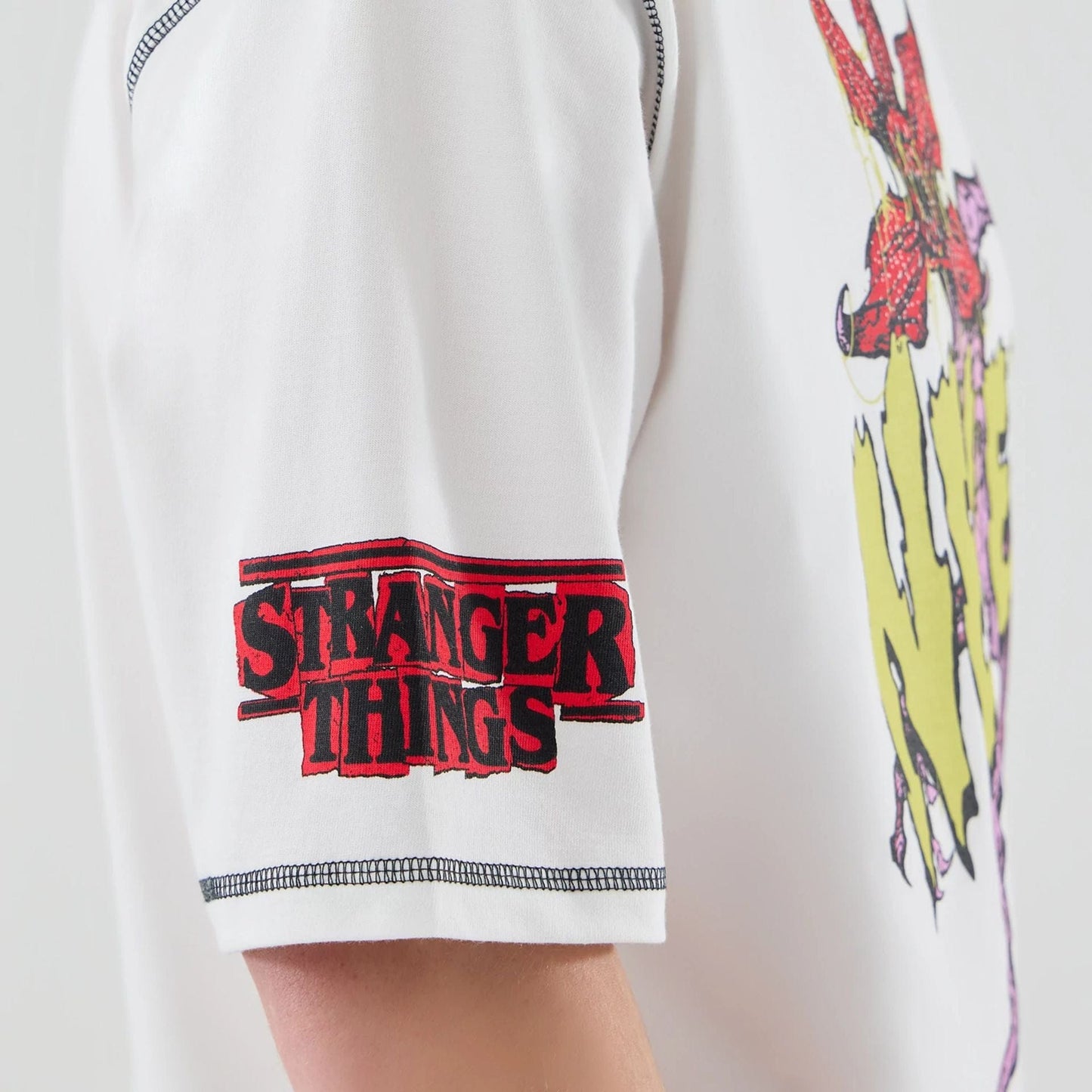 The Male model is wearing Stranger Things White Oversized T-Shirt  4