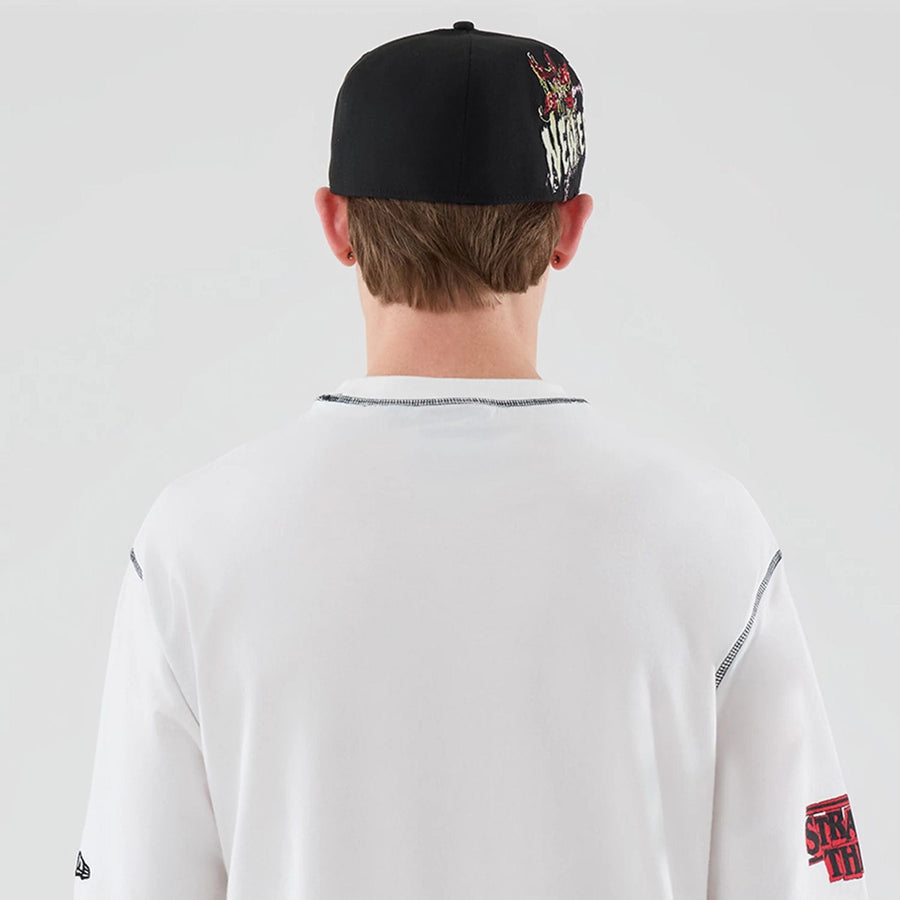 The Male model is wearing Stranger Things White Oversized T-Shirt  7