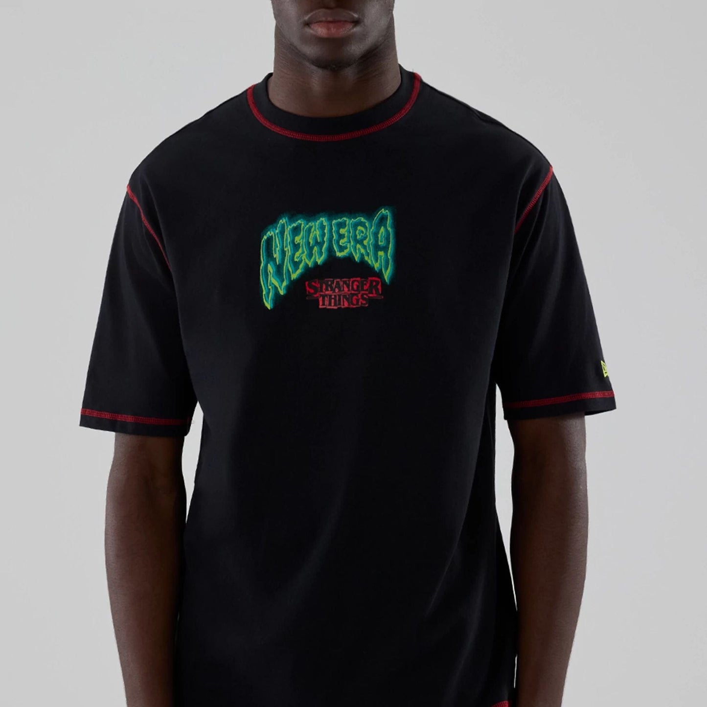 The Male model is wearing Stranger Things Black Oversized T-Shirt  3